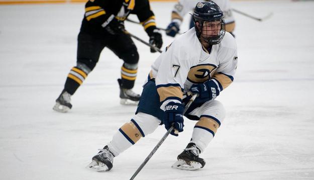 Men’s Hockey Surges Past Pipers