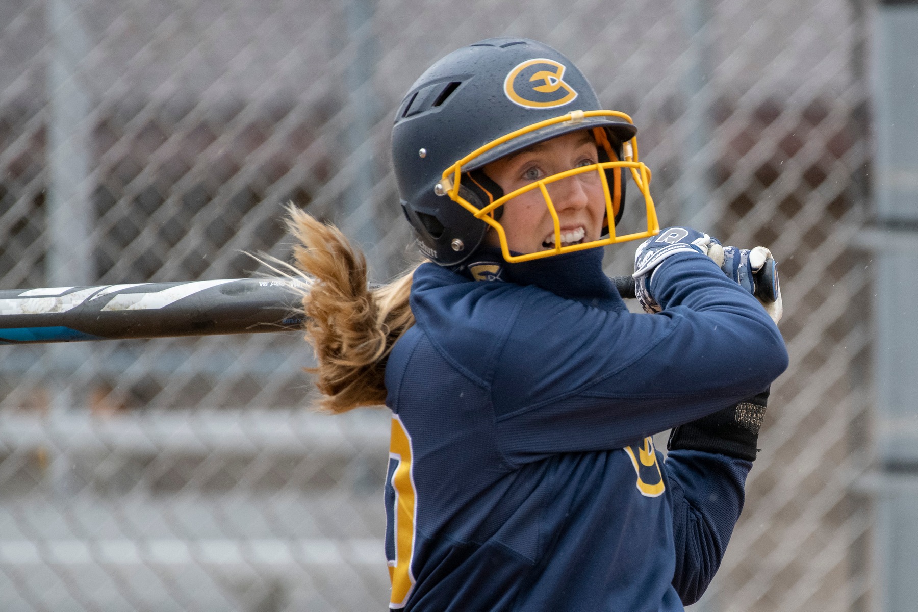 Softball falls to Wildcats, defeats Scots at Rochester Dome
