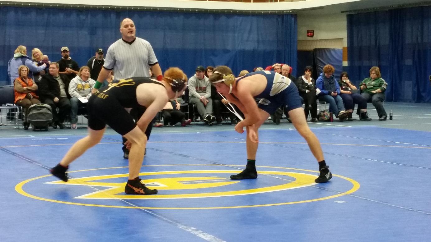 Blugold Wrestlers Fall to St. Olaf